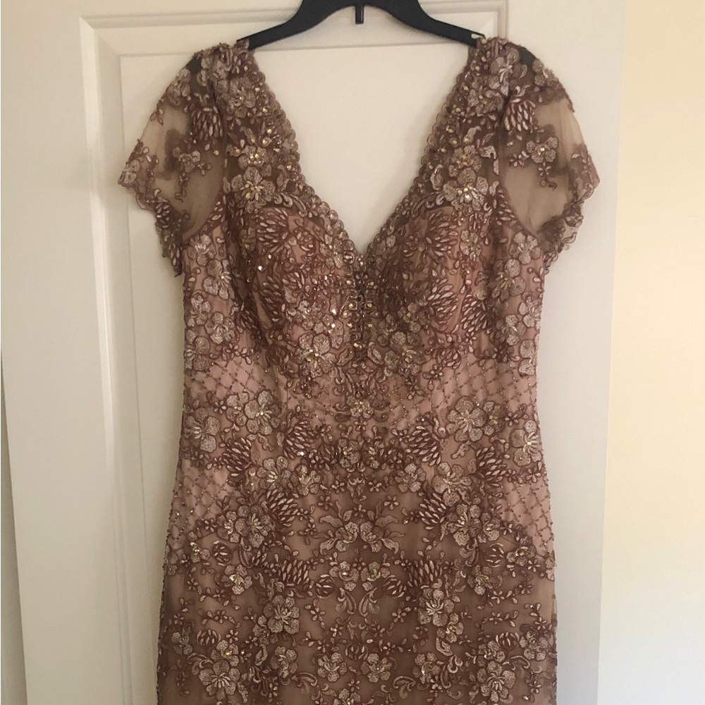A beautiful classy, mother of the bride gown, worn once and for sale!
